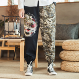 Embroidered silver dragon trousers
