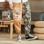 Embroidered silver dragon trousers
