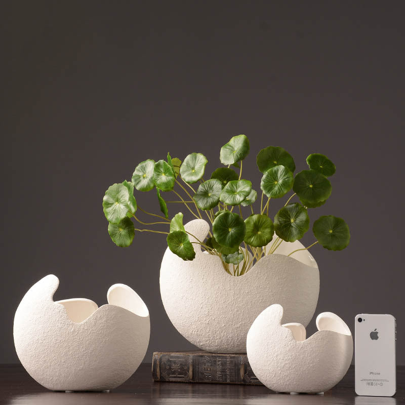 Simple white ceramic vase decoration
