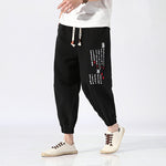 Embroidered harem track pants
