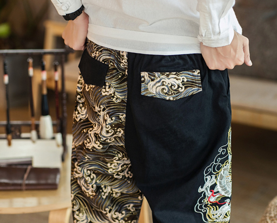 Embroidered silver dragon trousers
