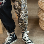 Embroidered silver dragon trousers
