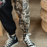 Embroidered silver dragon trousers
