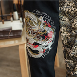 Embroidered silver dragon trousers
