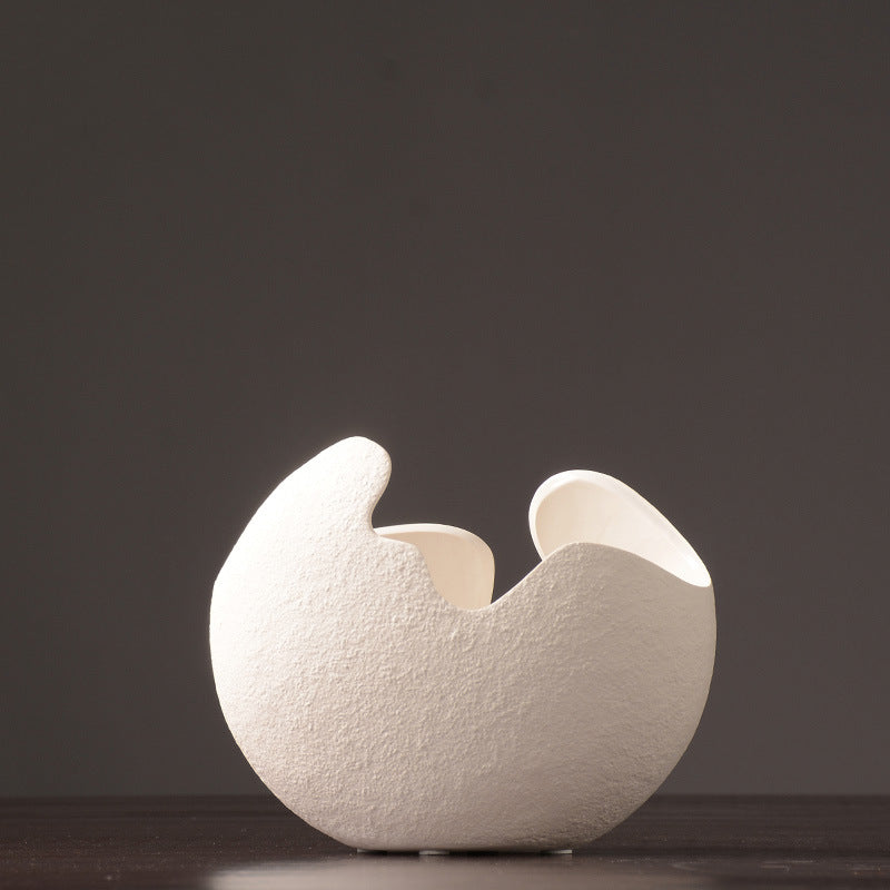 Simple white ceramic vase decoration
